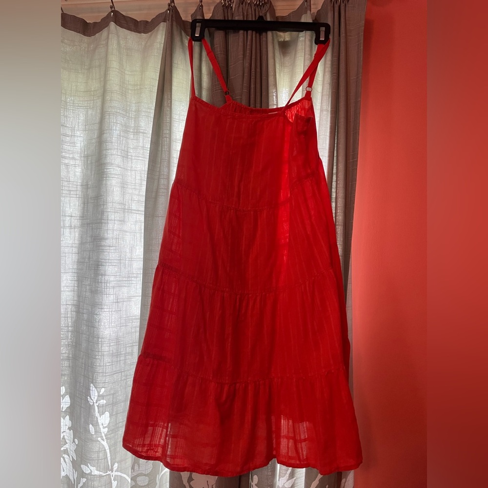 Light colored orange dress size medium,very comfortable great for casual outings